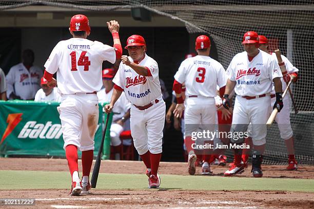 Diablos Rojos team celebrate against Acereros de Monclova during their match at the end of the 2010 Liga Mexicana de Beisebol serie at the Foro Sol...