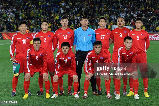 The North Korea team line up ahead of the 2010 FIFA World Cup South Africa Group G match between Brazil and North Korea at Ellis Park Stadium on June...