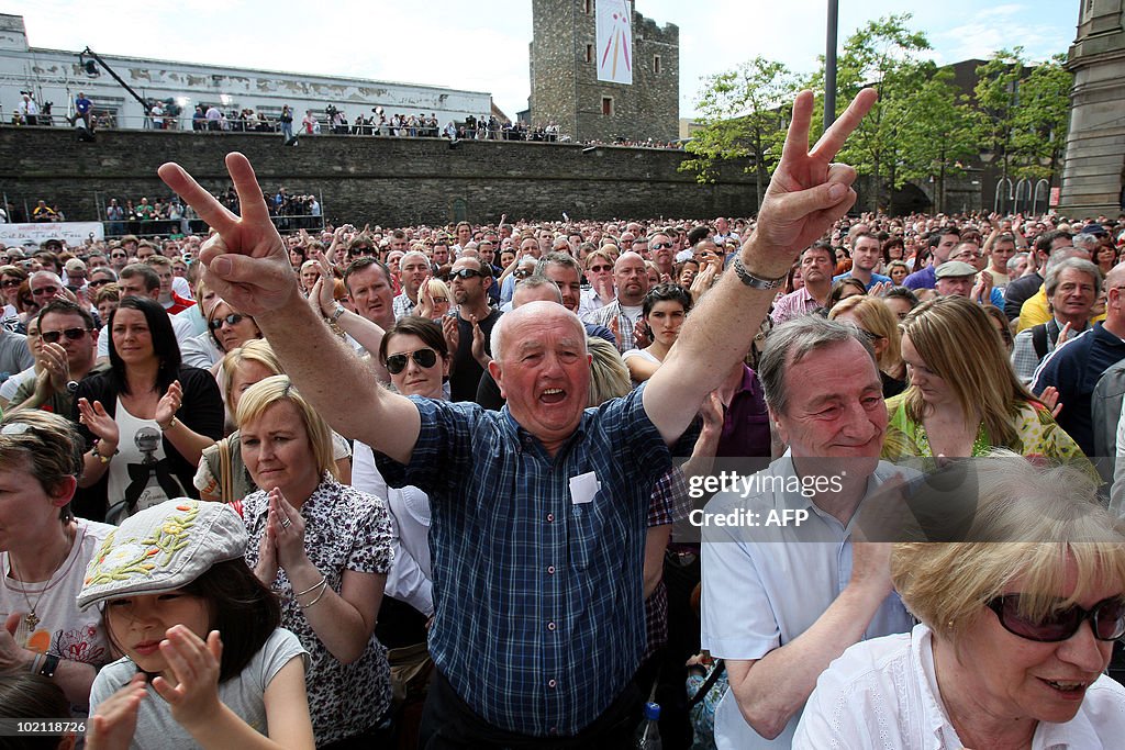 Crowds celebrate the findings of the lon