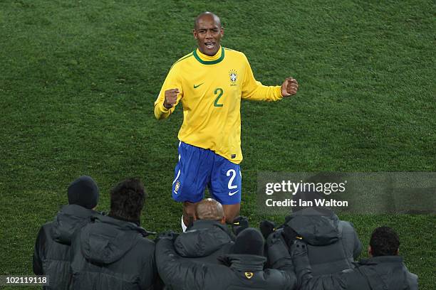 Maicon of Brazil celebrates after scoring the opening goal during the 2010 FIFA World Cup South Africa Group G match between Brazil and North Korea...