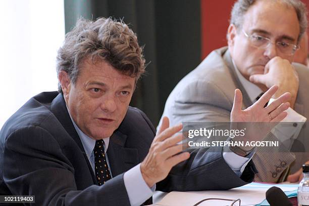 French Environment Jean-Louis Borloo next to president of the Corsica executive council Paul Giacobbi delivers a speech on June 15, 2010 during a...