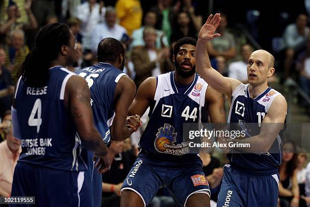 Aubrey Reese, Derrick Allen, Greg Jenkins and Pascal Roller of Frankfurt celebrate during game four of the Beko Basketball Bundesliga play off finals...