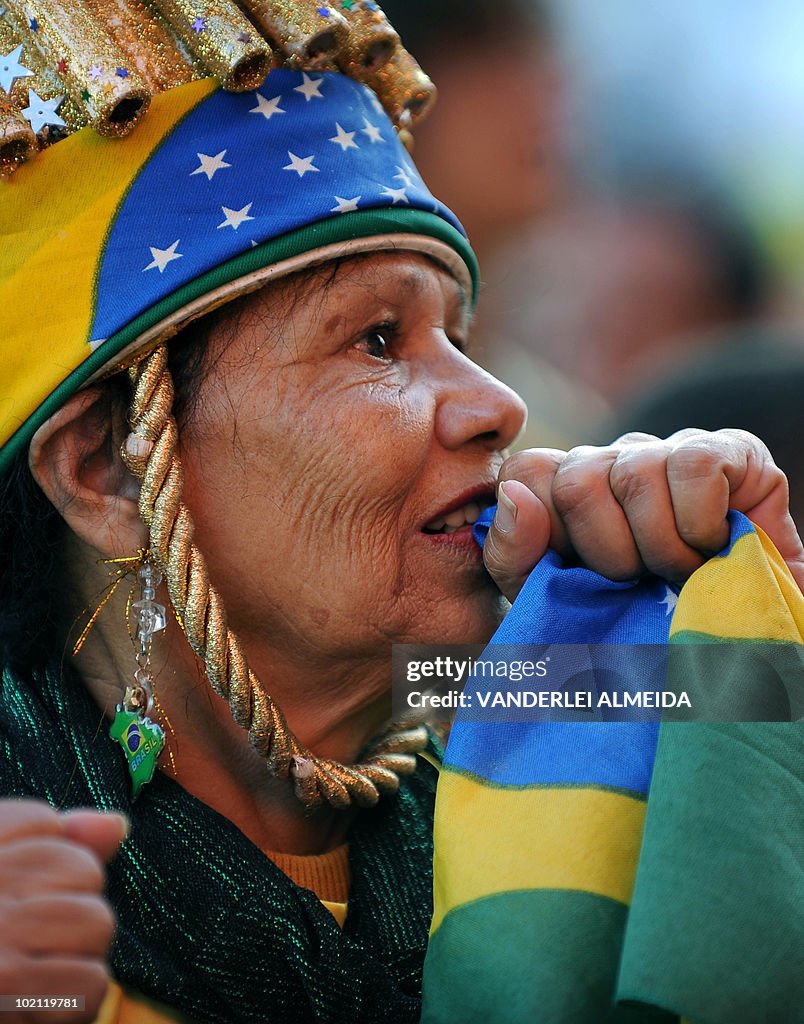 A Brazilian fan gestures at the end of t