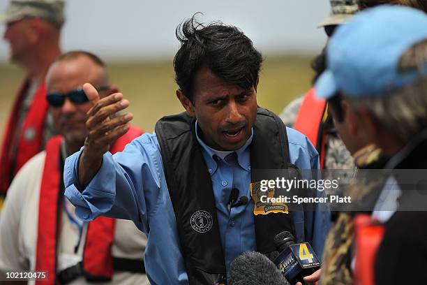 Louisiana Governor Bobby Jindal tours Bay Jimmy, which is heavily damaged by oil on June 15, 2010 off of Grand Isle, Louisiana. The BP spill has been...
