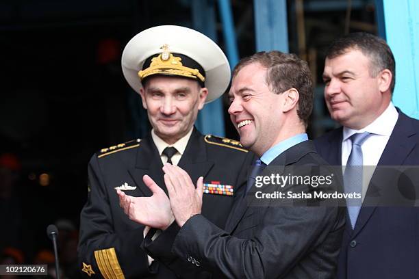 Russian President Dmitry Medvedev , Defense Minister Anatoliy Serdyukov and Chief Commander of Russian Navy Vladimir Vysotsky applaud during a...