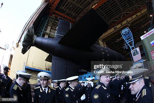 Military personnel a ceremony to launch the multipurpose nuclear submarine 'Severodvinsk' at the Sevmash shipyard June 15, 2010 in the Northern...