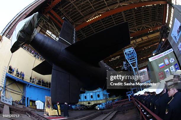 Military personnel a ceremony to launch the multipurpose nuclear submarine 'Severodvinsk' at the Sevmash shipyard June 15, 2010 in the Northern...