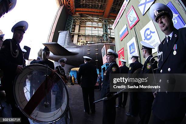 Military personnel a ceremony to launch the multipurpose nuclear submarine 'Severodvinsk' at the Sevmash shipyard June 15, 2010 in the Northern...