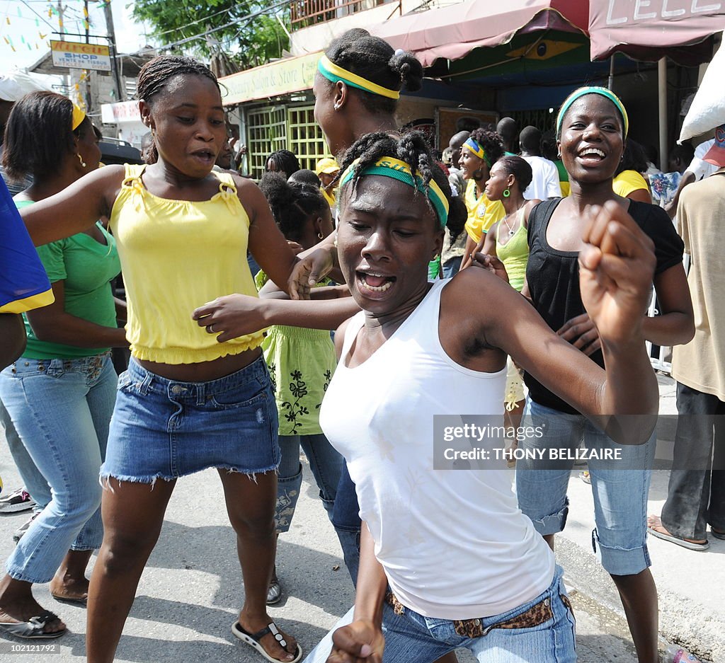 Haitians celebrate on a street June 15,
