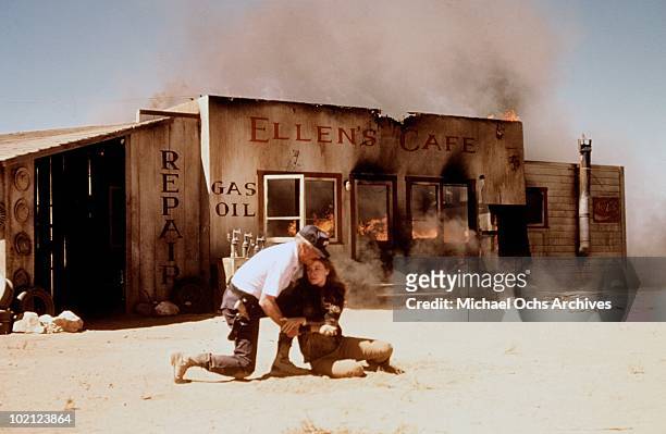 Actors George Peppard and Dominique Sanda in a scene from the movie 'Damnation Alley' in 1977.