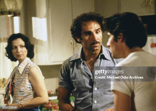 Actors Tony Lo Bianco , Lelia Goldoni and Richard Gere in a scene from the movie 'Bloodbrothers' in 1977 in New York, New York.