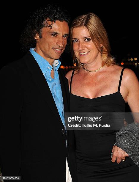 Actor Enrico Lo Verso and his wife attend a party at The Lancia Cafe on June 15, 2010 in Taormina, Italy.