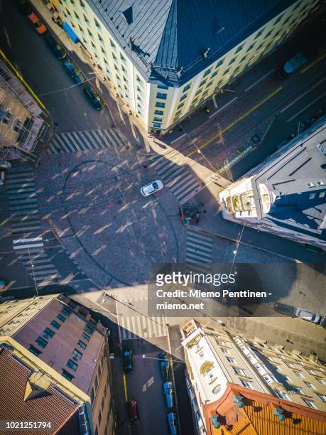 top-down aerial view onto an intersection of five roads in downtown helsinki - helsinki stock pictures, royalty-free photos & images