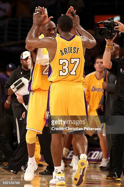 Kobe Bryant and Ron Artest of the Los Angeles Lakers celebrate in the second half against the Boston Celtics in Game Six of the 2010 NBA Finals at...