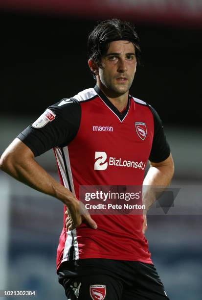 Zak Mills of Morecambe in action during the Sky Bet League Two match between Morecambe and Northampton Town at Globe Arena on August 21, 2018 in...