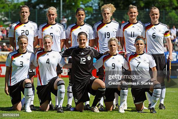 The team of Germany poses for photographers prior the DFB Women's U20 friendly match between Germany and Japan at the Heidewald Stadium on June 16,...