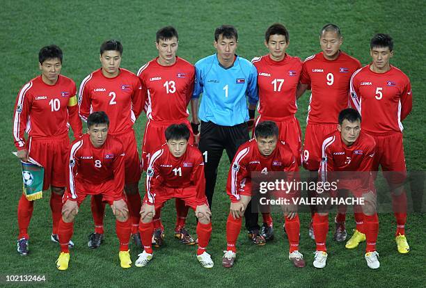 North Korea's defender Ji Yun-Nam, North Korea's midfielder Mun In-Guk, North Korea's midfielder Pak Nam-Chol and North Korea's defender Ri Jun-Il...