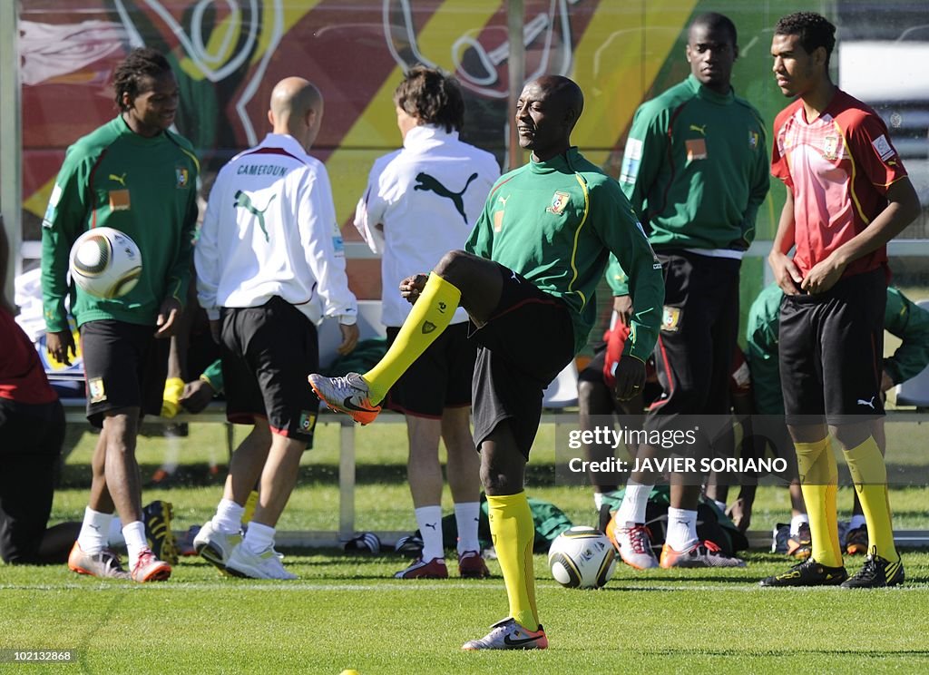 Cameroon's defender Sebastien Bassong (C