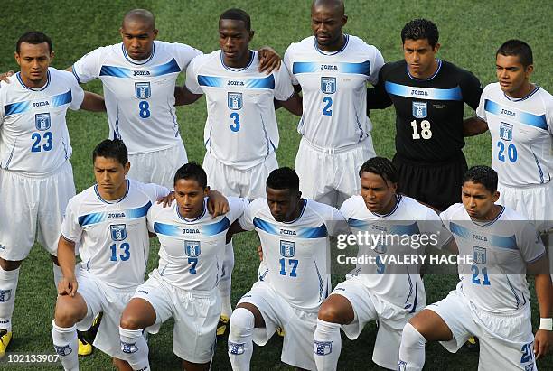 Honduras' players pose for a group picture before the start of their Group H first round 2010 World Cup football match against Chile on June 16, 2010...