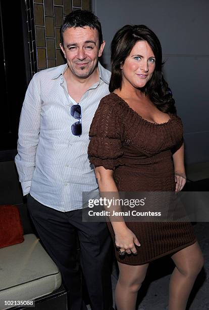 Hair stylist and salon owner Nick Arrojo and hair stylist Tatiana Petersen pose for a photo during "Purple Nights", a fund raiser presented by the...