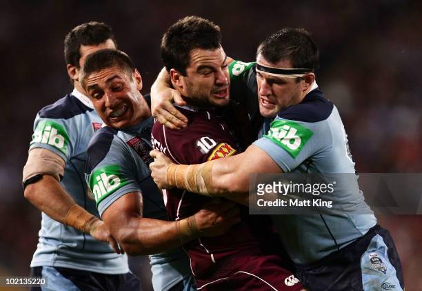 David Shillington of the Maroons is tackled by Tom Learoyd-Lahrs and Paul Gallen of the Blues during game two of the ARL State of Origin Series...