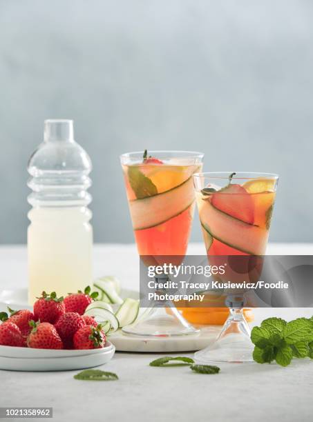 pimms cup cocktail - cucumber cocktail stock pictures, royalty-free photos & images