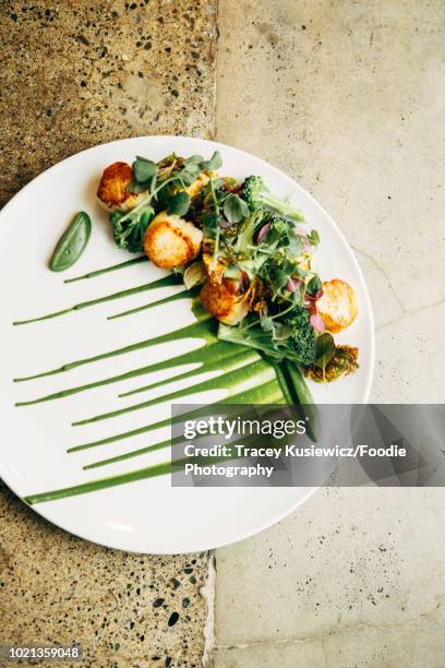 scallops with pea puree - molecular gastronomy stock pictures, royalty-free photos & images