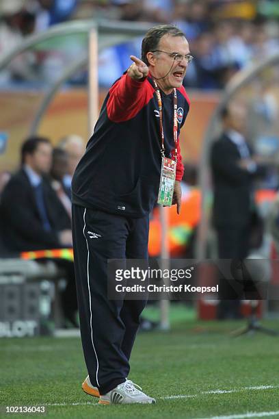 Marcelo Bielsa head coach of Chile calls instructions to his players during the 2010 FIFA World Cup South Africa Group H match between Honduras and...