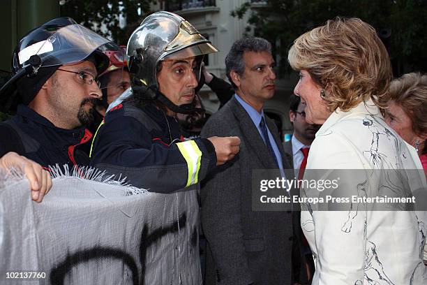 President of Madrid region, Esperanza Aguirre, was rebuked by firemen on June 15, 2010 in Madrid, Spain. The firemen report that she is trying to...