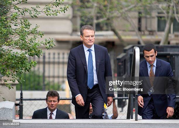 Carl-Henric Svanberg, chairman of BP Plc, center, arrives at the White House with Tony Hayward, chief executive officer of BP Plc, left, in...