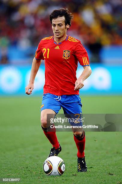 David Silva of Spain runs with the ball during the 2010 FIFA World Cup South Africa Group H match between Spain and Switzerland at Durban Stadium on...