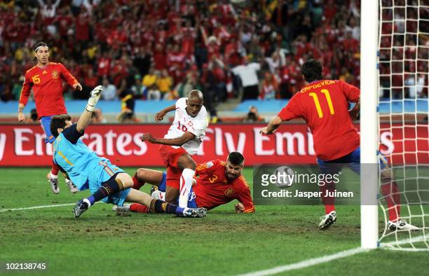 Gelson Fernandes of Switzerland scores the first goal during the 2010 FIFA World Cup South Africa Group H match between Spain and Switzerland at...