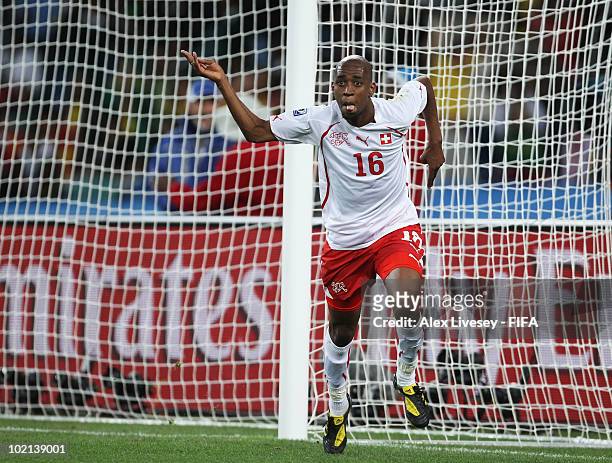 Gelson Fernandes of Switzerland celebrates scoring the first goal during the 2010 FIFA World Cup South Africa Group H match between Spain and...