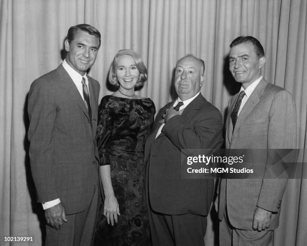 The stars and director of the film 'North By Northwest', 1959. From left to right, Cary Grant , Eva Marie Saint, director Alfred Hitchcock and James...