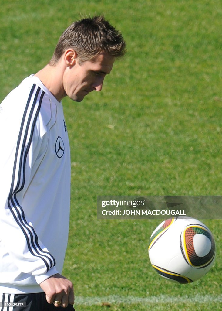 Germany's striker Miroslav Klose warms u