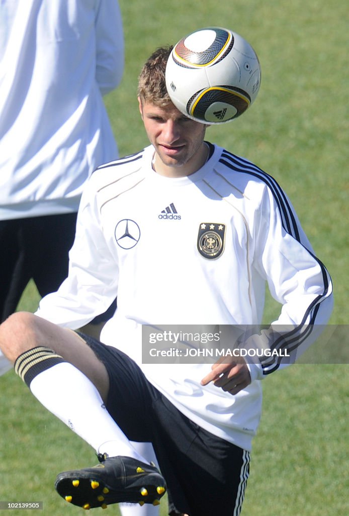 Germany's striker Thomas Mueller warms u