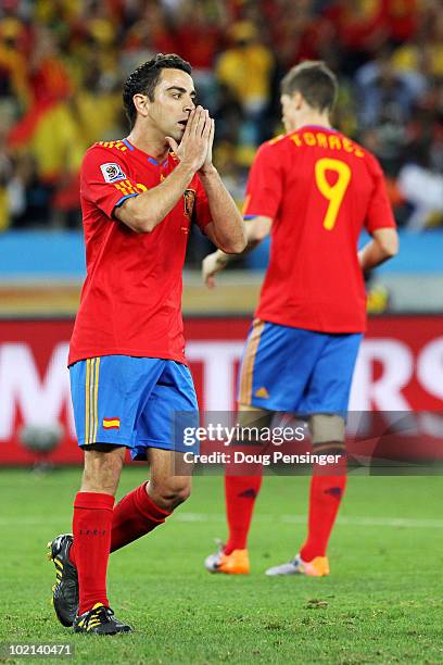 Xavi Hernandez of Spain looks dejected at the final whistle as Spain lose the 2010 FIFA World Cup South Africa Group H match between Spain and...