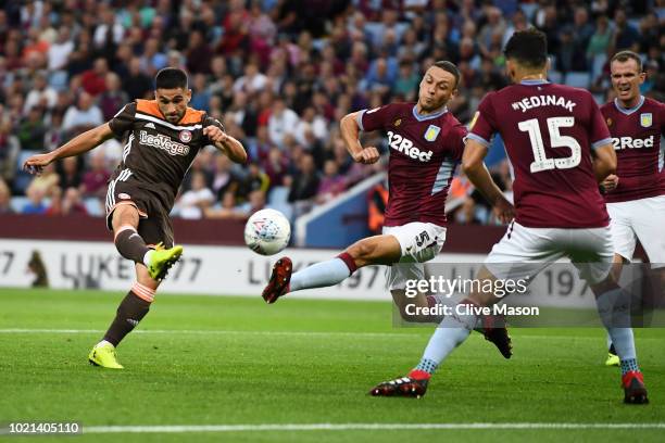 Neal Maupay of Brentford scores his team's first goal during the Sky Bet Championship match between Aston Villa and Brentford at Villa Park on August...