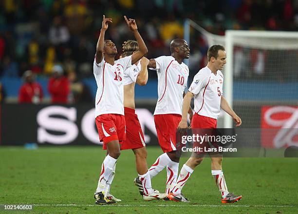 Gelson Fernandes of Switzerland celebrates with team mates after winning the 2010 FIFA World Cup South Africa Group H match between Spain and...