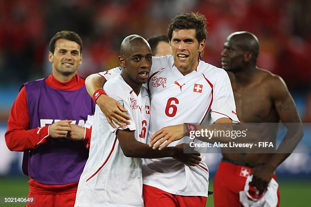 Goalscorer Gelson Fernandes of Switzerland celebrates victory with team mate Benjamin Huggel after the 2010 FIFA World Cup South Africa Group H match...