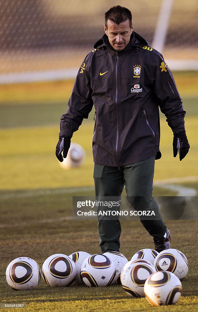 Brazil's coach Dunga kicks somes balls d