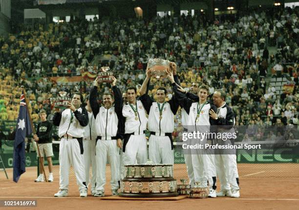 The Spanish Davis Cup team lift the trophy after defeating Australia in the Final of the Davis Cup between Spain and Australia at the Palau Sant...