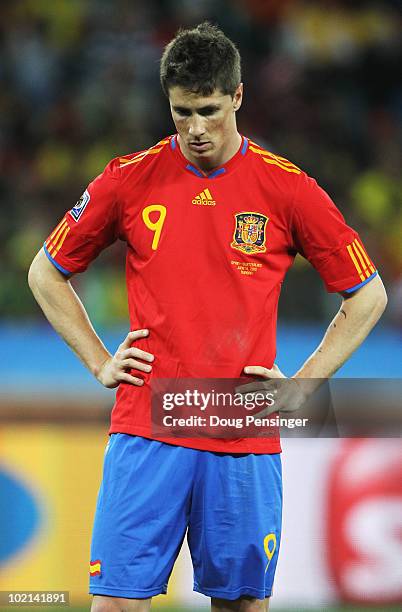 Fernando Torres of Spain looks dejected after defeat in the 2010 FIFA World Cup South Africa Group H match between Spain and Switzerland at Durban...