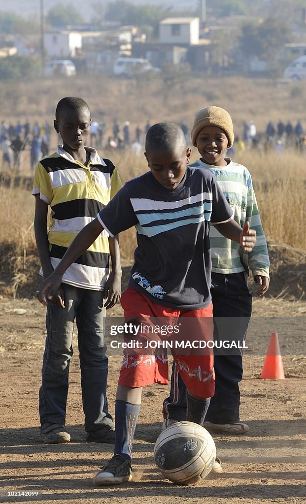 South African youths play with a footbal