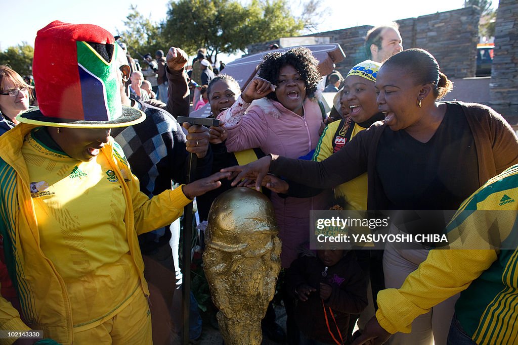 South African supporters cheer near a mo