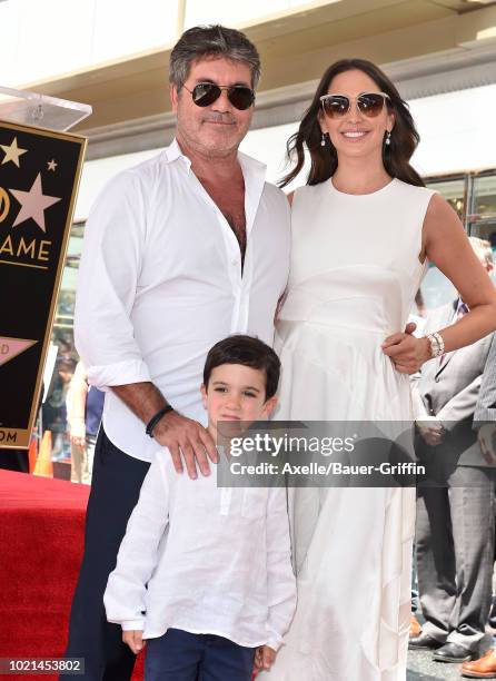 Simon Cowell, Lauren Silverman and Eric Cowell attend the ceremony honoring Simon Cowell with star on the Hollywood Walk of Fame on August 22, 2018...