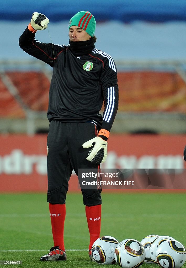 Mexican goalkeeper Guillermo Ochoa looks