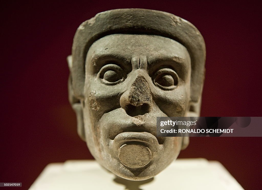 A figure of stone is displayed during a