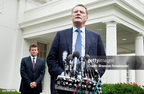 British Petroleum Chief Executive Tony Hayward listens while Chairman Carl-Henric Svanberg speaks to the press outside the West Wing of the White...