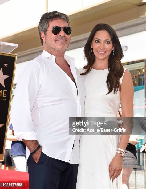 Simon Cowell and Lauren Silverman attend the ceremony honoring Simon Cowell with star on the Hollywood Walk of Fame on August 22, 2018 in Hollywood,...
